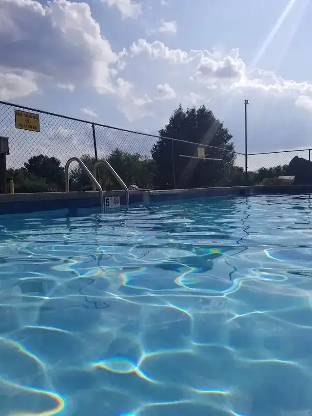 Close view of the pool water, clear and blue
